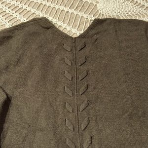 Long cardigan sweater.